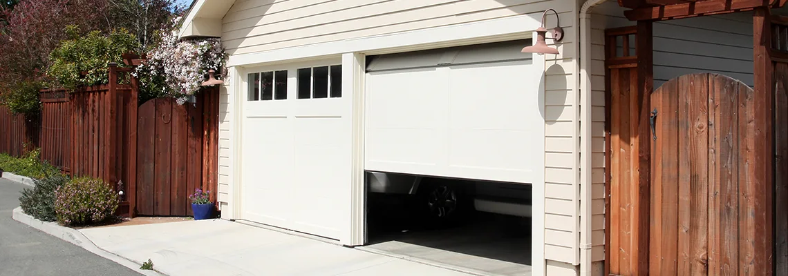 Fix Metal Garage Door Jerking in Port St Lucie